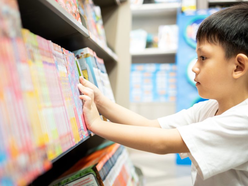 Bookshops in the Maldives - a boy picks his next read