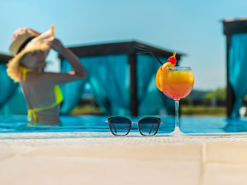 Enjoying a drink by the pool in Maldives