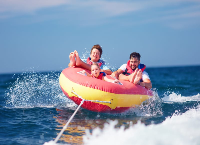 A family enjoys tubing in the Maldives