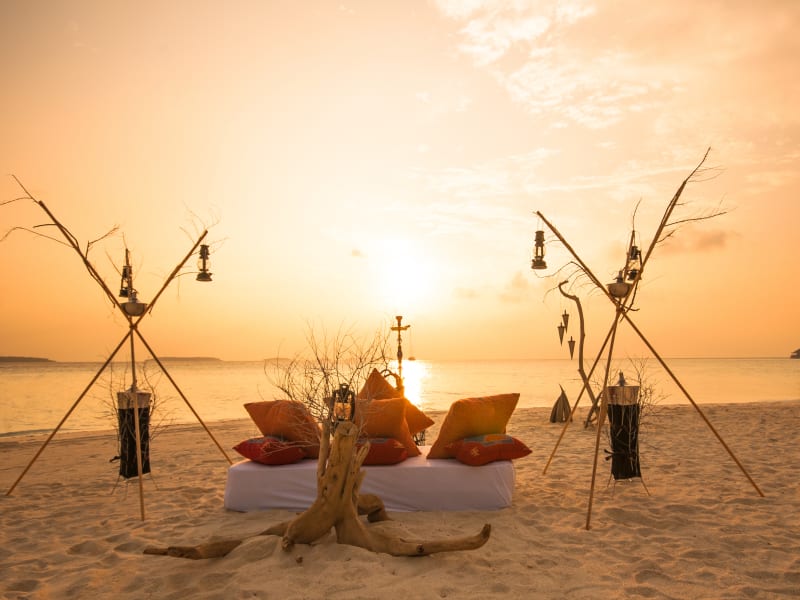 Sunset on a sandbank in Maldives