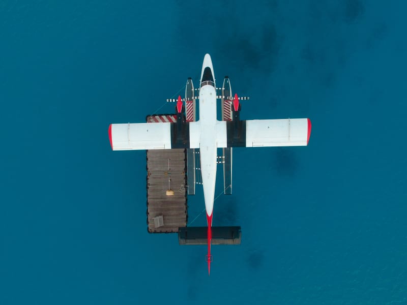 Seaplane waiting at a resort pontoon