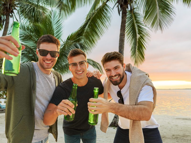 Friends enjoying a sundowner in the Maldives