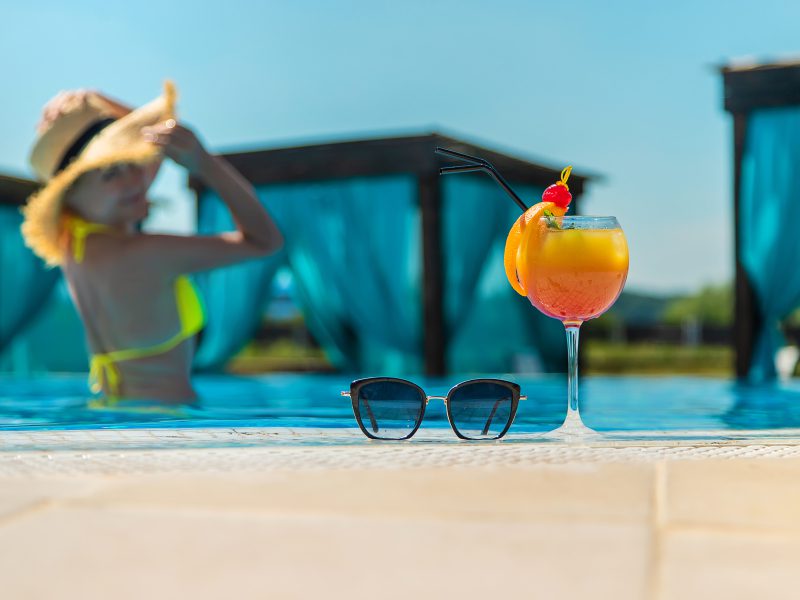 Enjoying a drink by the pool in Maldives