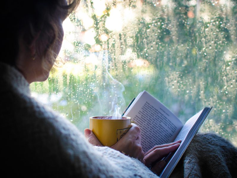 Reading a book on a rainy day