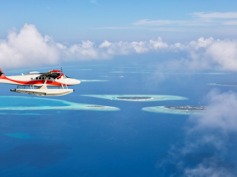 Maldives seaplane over Indian Ocean