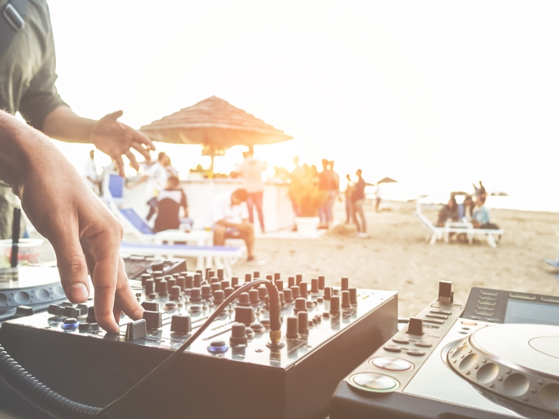 DJ playing on the beach